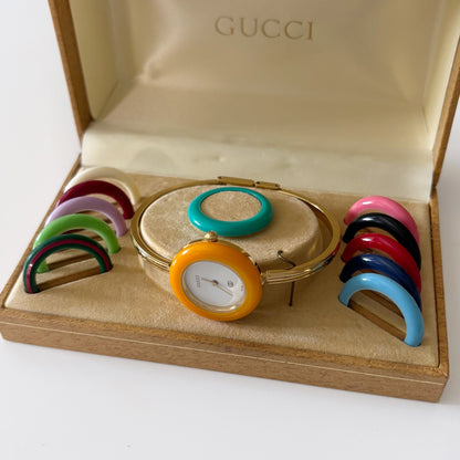 Gucci 1990s Interchangeable Bezel Gold Plated Bangle Watch with 12 bezels, Case