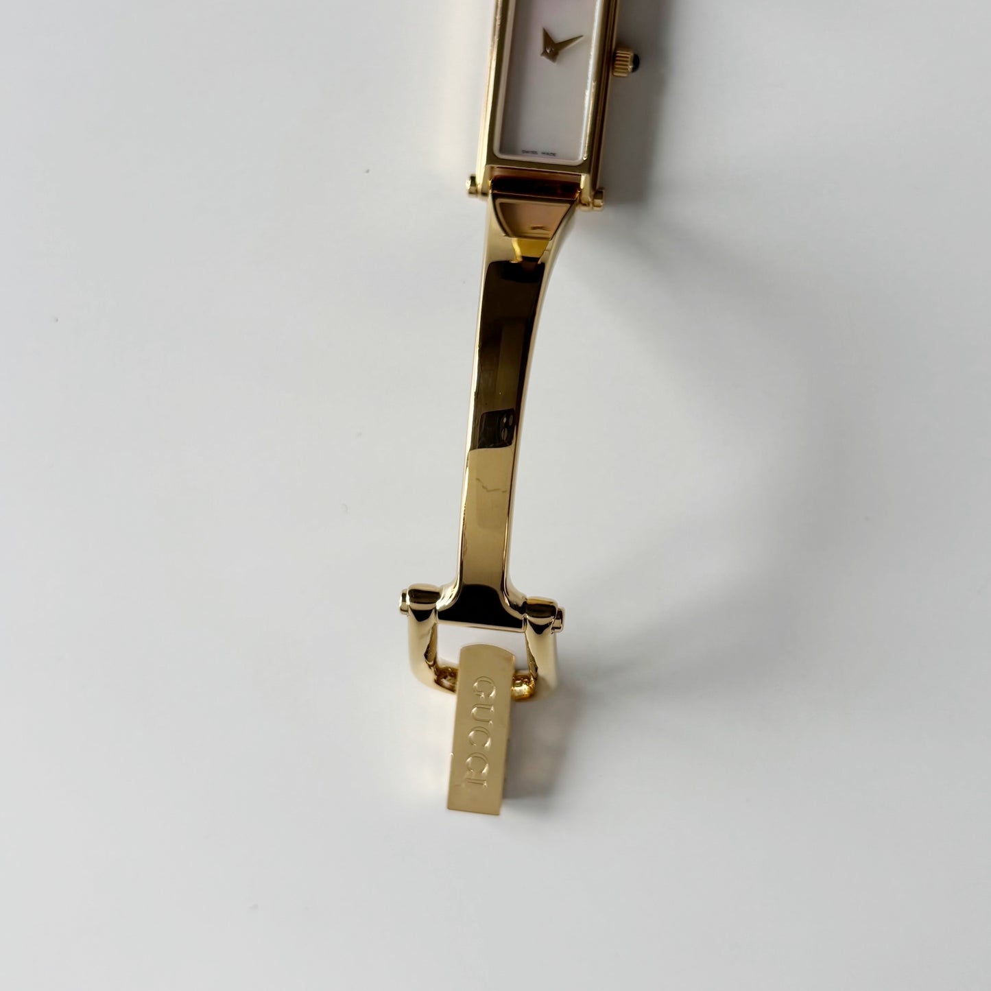 Gucci 1990s Seashell Rectangular Dial Gold Plated Bangle Watch