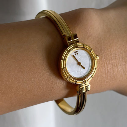 Yves Saint Laurent Seashell Dial Gold Plated Bangle Watch