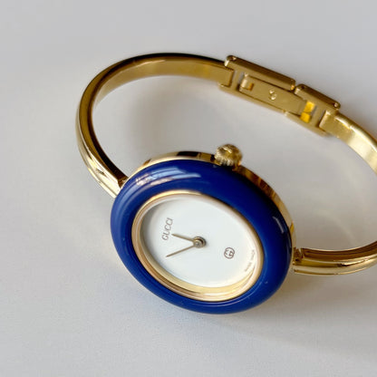 Gucci 1990s Interchangeable Bezel Gold Plated Bangle Watch with 12 bezels, case (Small)