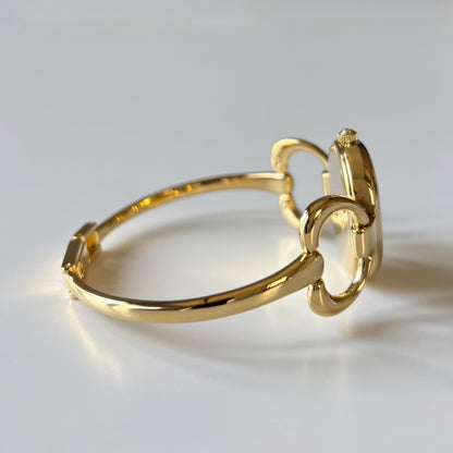 Gucci 1990s Oval Dial Gold Plated Bangle Watch