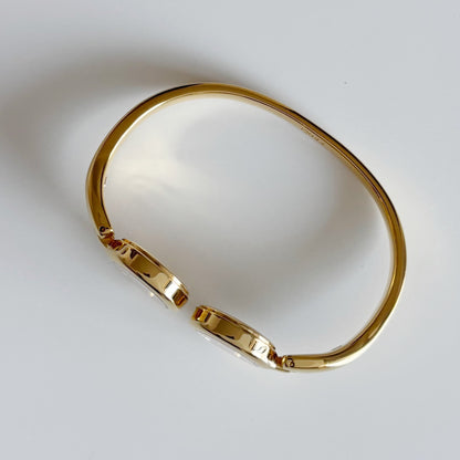 Fendi 1990s Seashell Dial Two Time Zone Gold Plated Bangle Watch