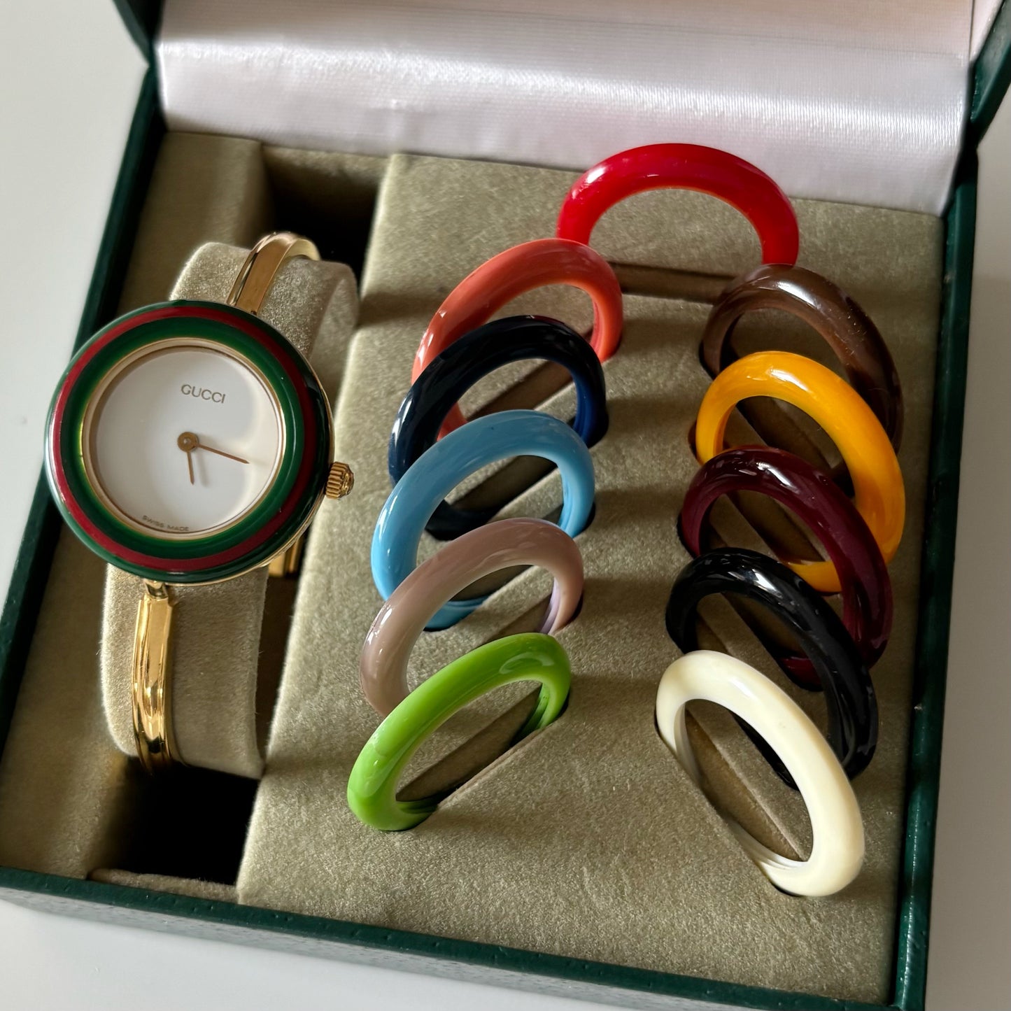 Gucci 1990s Interchangeable Bezel Gold Plated Bangle Watch with 12 bezels, case (Small)