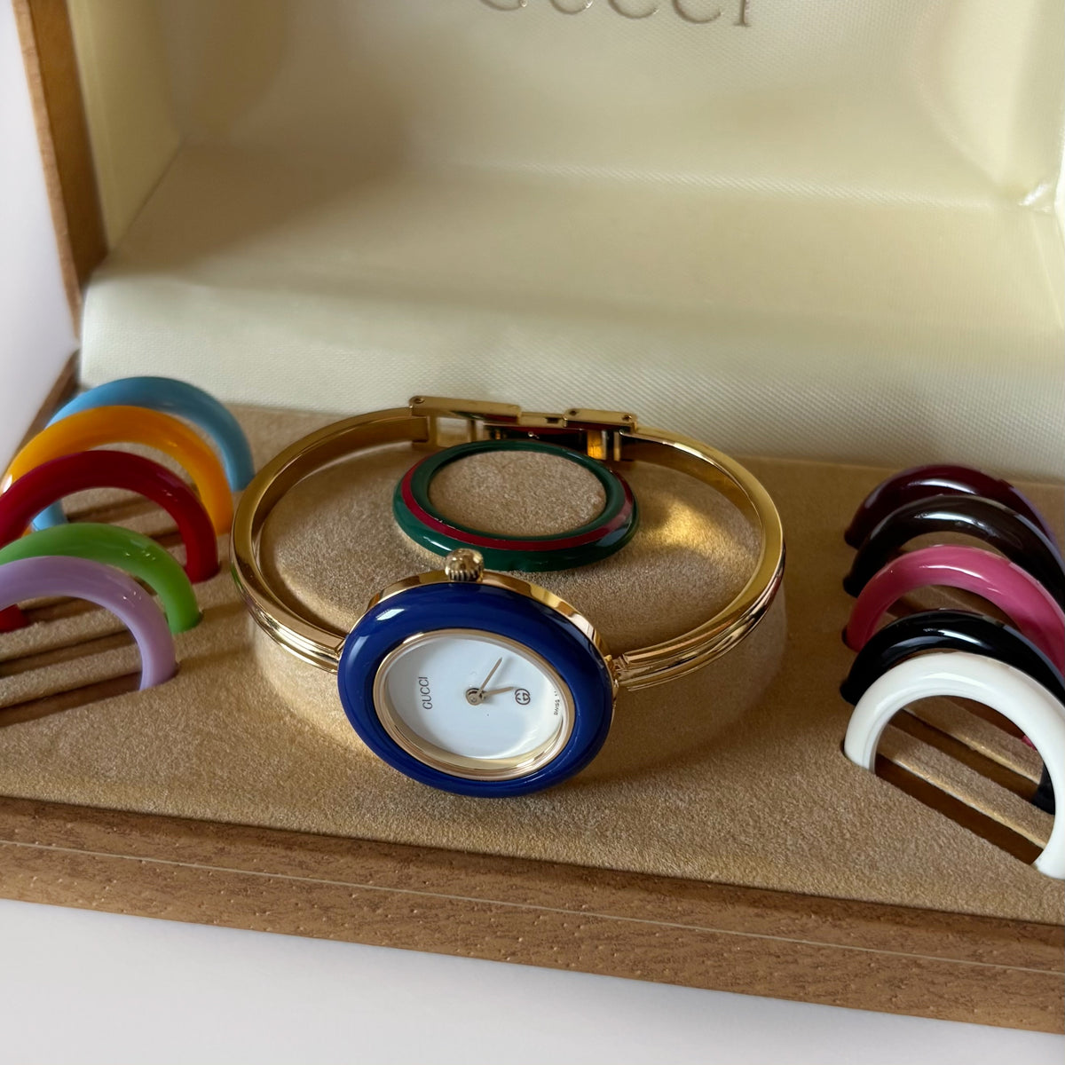 Gucci 1990s Interchangeable Bezel Gold Plated Bangle Watch with 12 bezels, case (Small)
