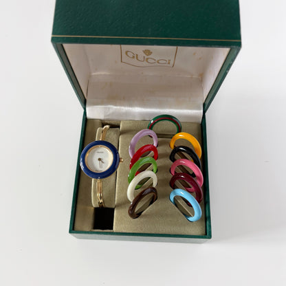 Gucci 1990s Interchangeable Bezel Gold Plated Bangle Watch with 12 bezels, case