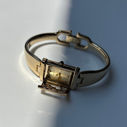 Yves Saint Laurent 1990s Peek a boo Gold Plated Bangle Watch