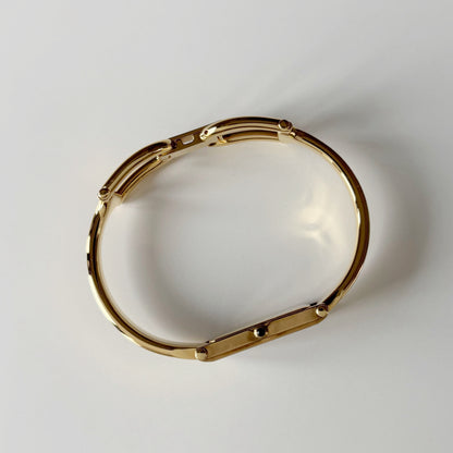 Gucci 1990s Gold Rectangular Dial Gold Plated Bangle Watch