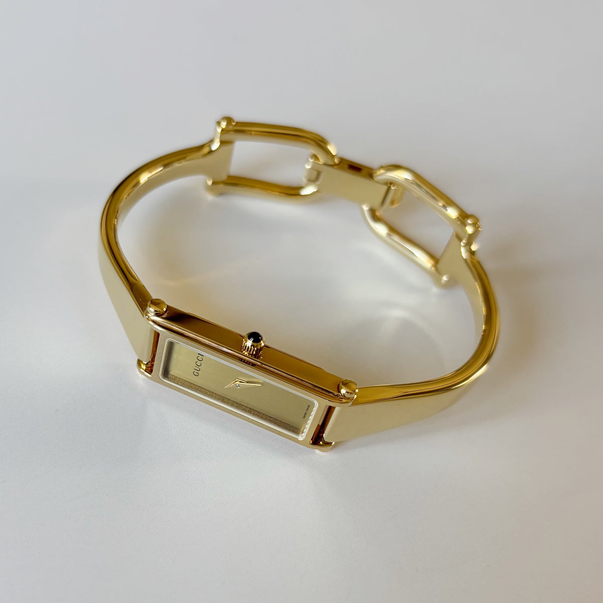 Gucci 1990s Rectangular Gold Dial Gold-Plated Watch