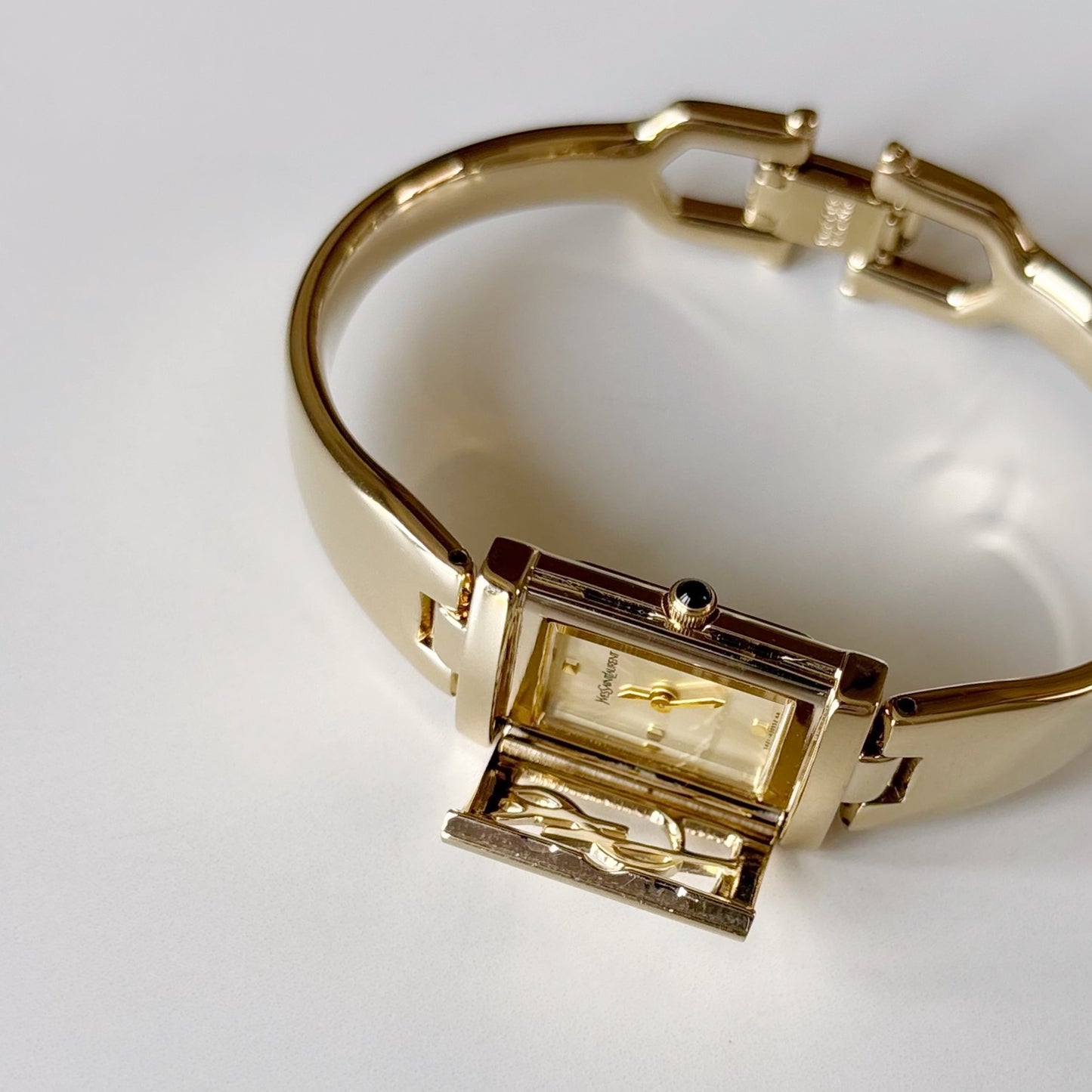 Yves Saint Laurent 1990s Peek a boo Gold Plated Bangle Watch
