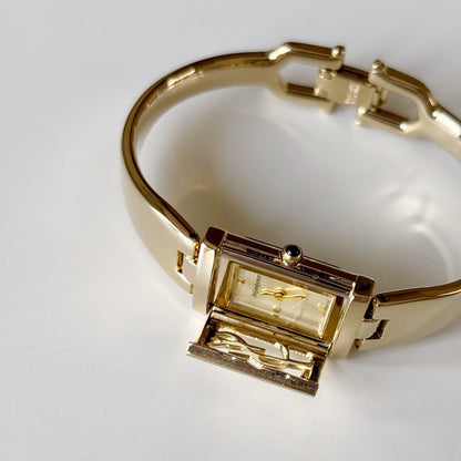 Yves Saint Laurent 1990s Peek a boo Gold Plated Bangle Watch