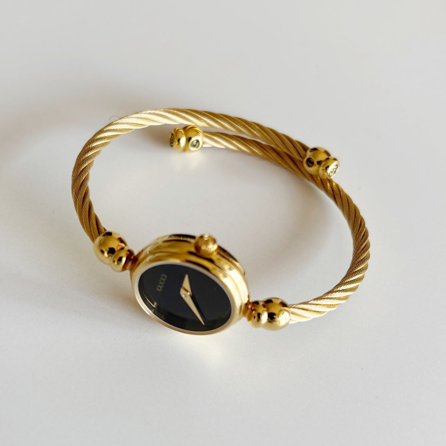Gucci 1990s Black Dial Gold Plated Cable Bangle Watch