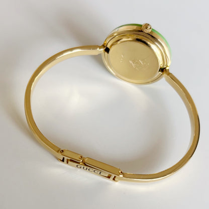 Gucci 1990s Interchangeable Bezel Gold Plated Bangle Watch with 12 bezels, case
