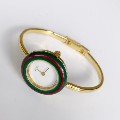 Gucci 1990s Interchangeable Bezel Gold Plated Bangle Watch with 12 bezels, case