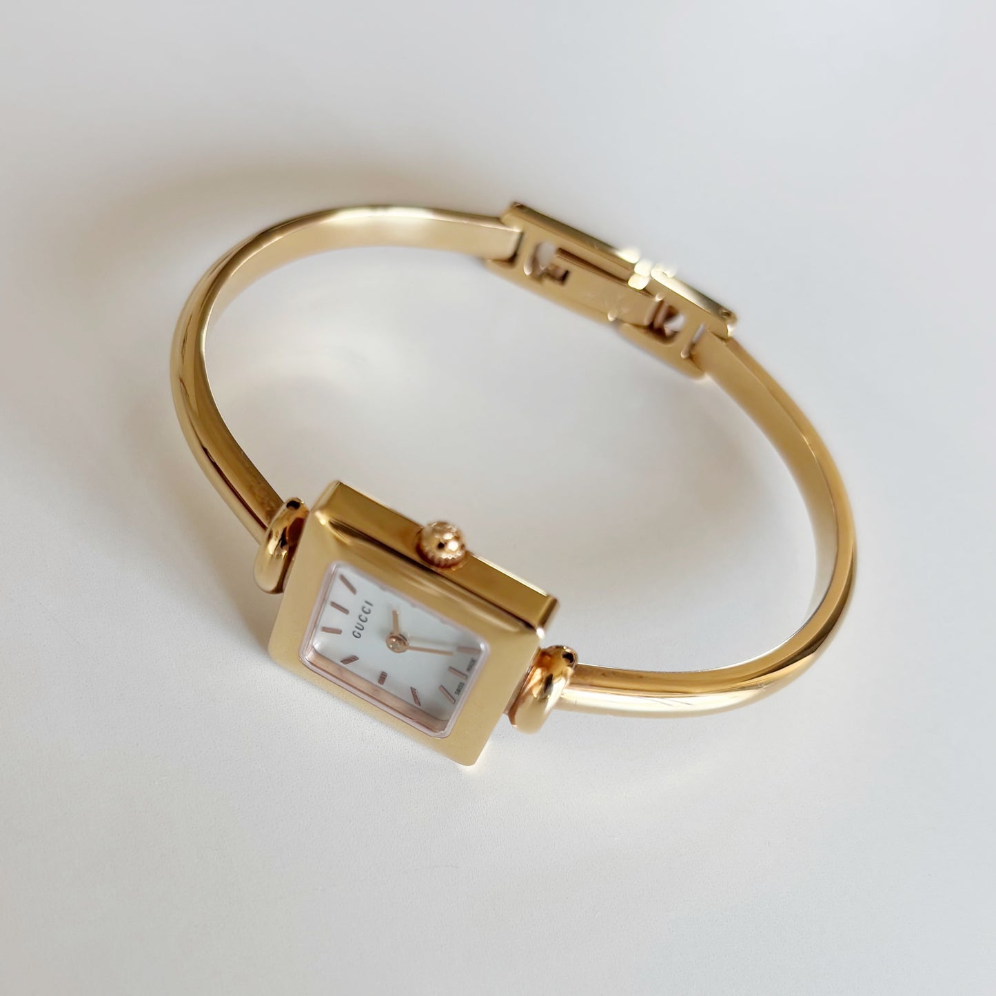 Gucci 1990s Seashell Square Dial Gold Plated Bangle Watch