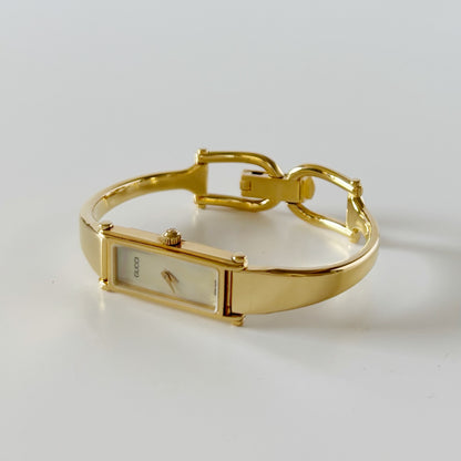 Gucci 1990s Seashell Rectangular Dial Gold Plated Bangle Watch