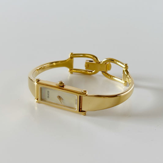 Gucci 1990s Seashell Rectangular Dial Gold Plated Bangle Watch