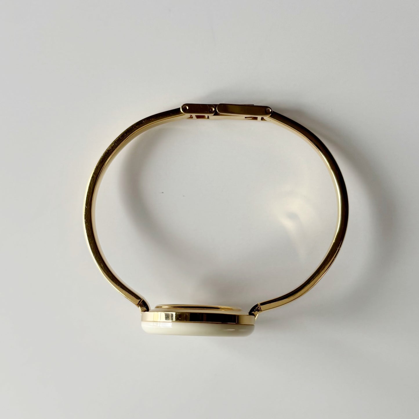 Gucci 1990s Interchangeable Bezel Gold Plated Bangle Watch with 12 bezels, case