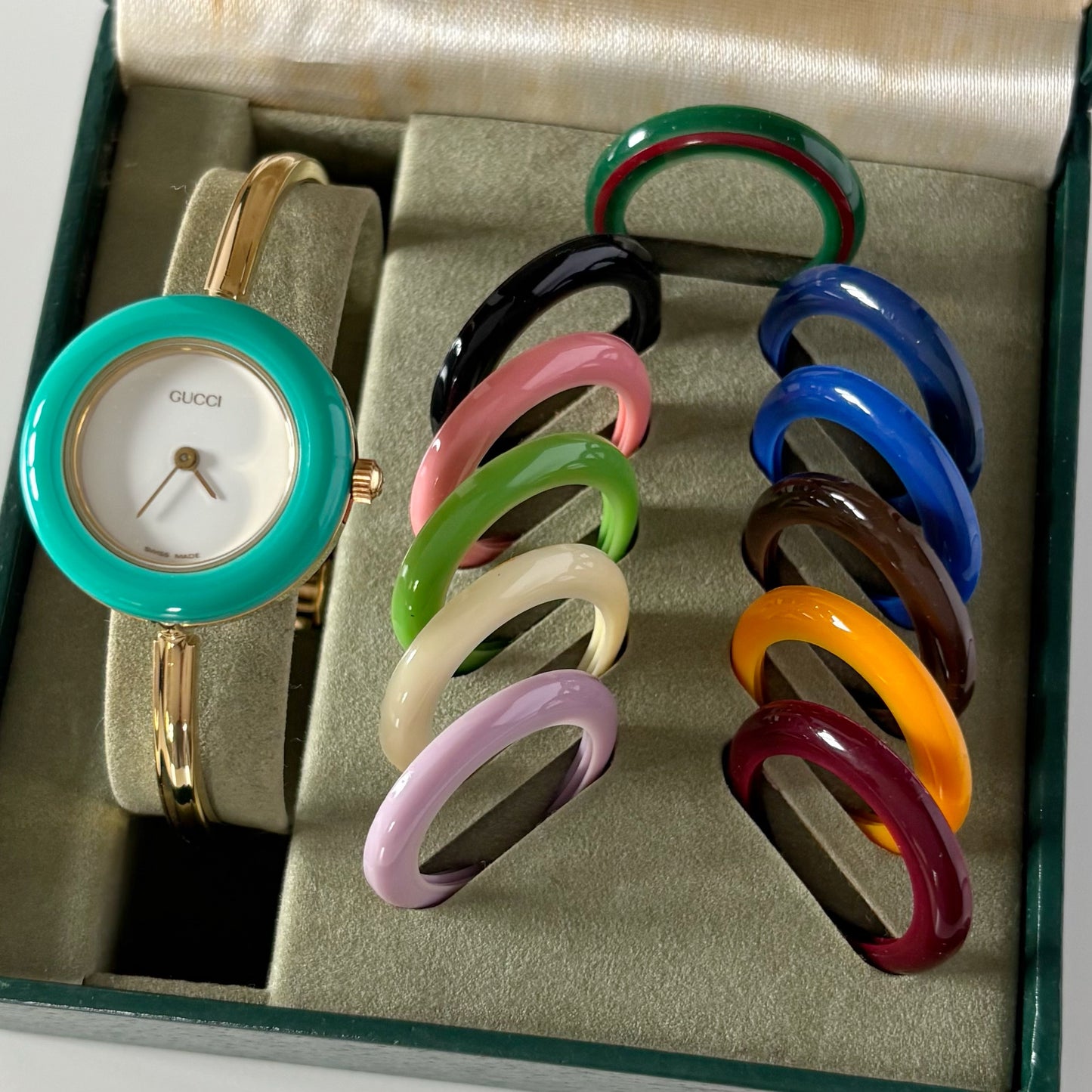 Gucci 1990s Interchangeable Bezel Gold Plated Bangle Watch with 12 bezels, case