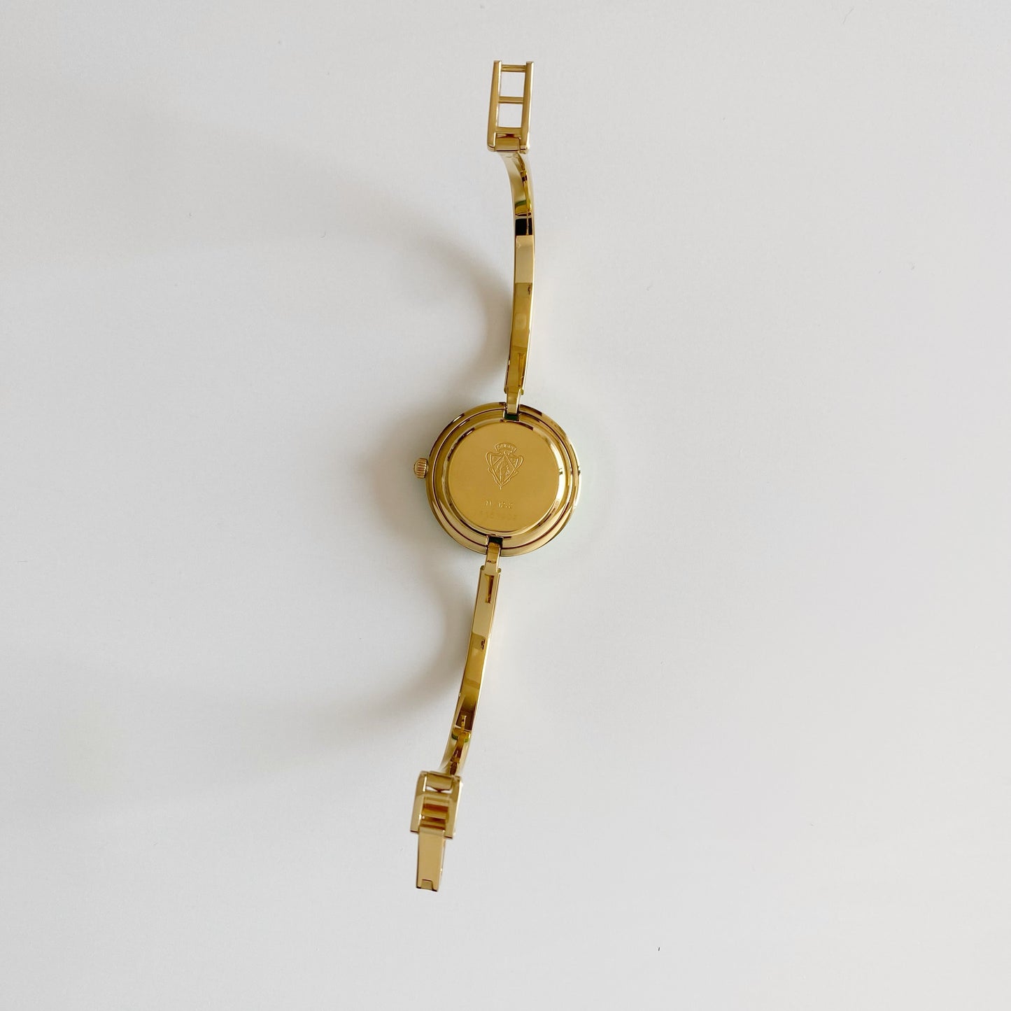 Gucci 1990s Interchangeable Bezel Gold Plated Bangle Watch with 12 bezels, case (Small)