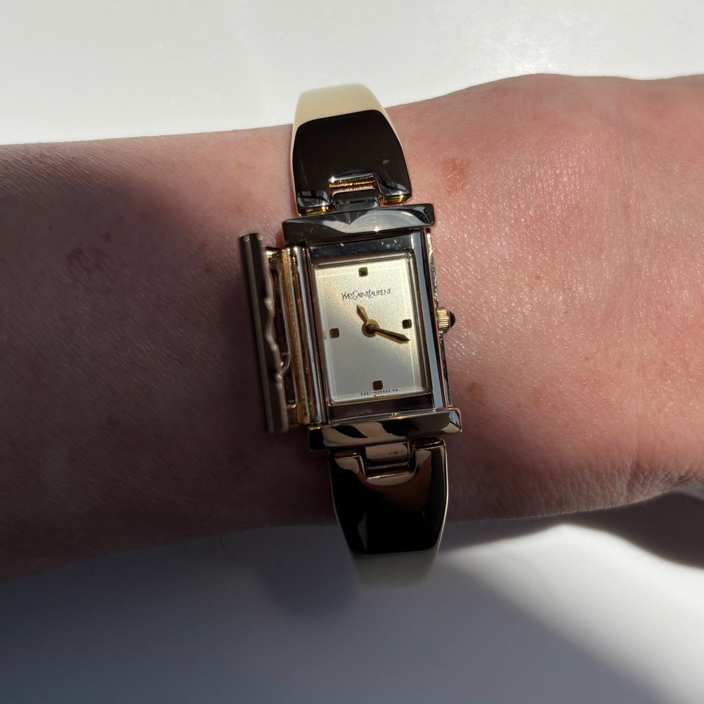 Yves Saint Laurent 1990s Peek-A-Boo Gold Plated Bangle Watch