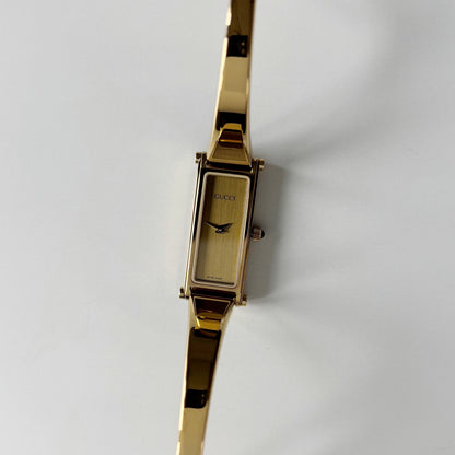 Gucci 1990s Gold Rectangular Dial Gold Plated Bangle Watch