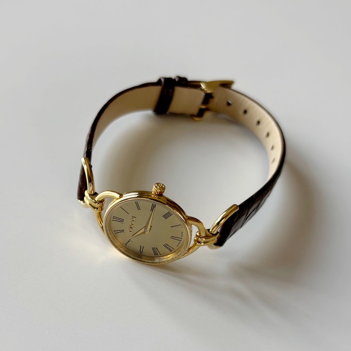Gucci 1990s Gold Round Dial Horsebit Gold Plated Watch
