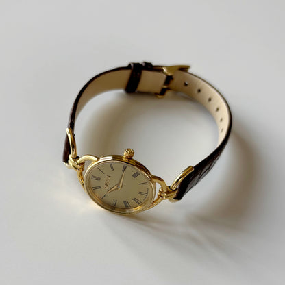 Gucci 1990s Gold Round Dial Horsebit Gold Plated Watch