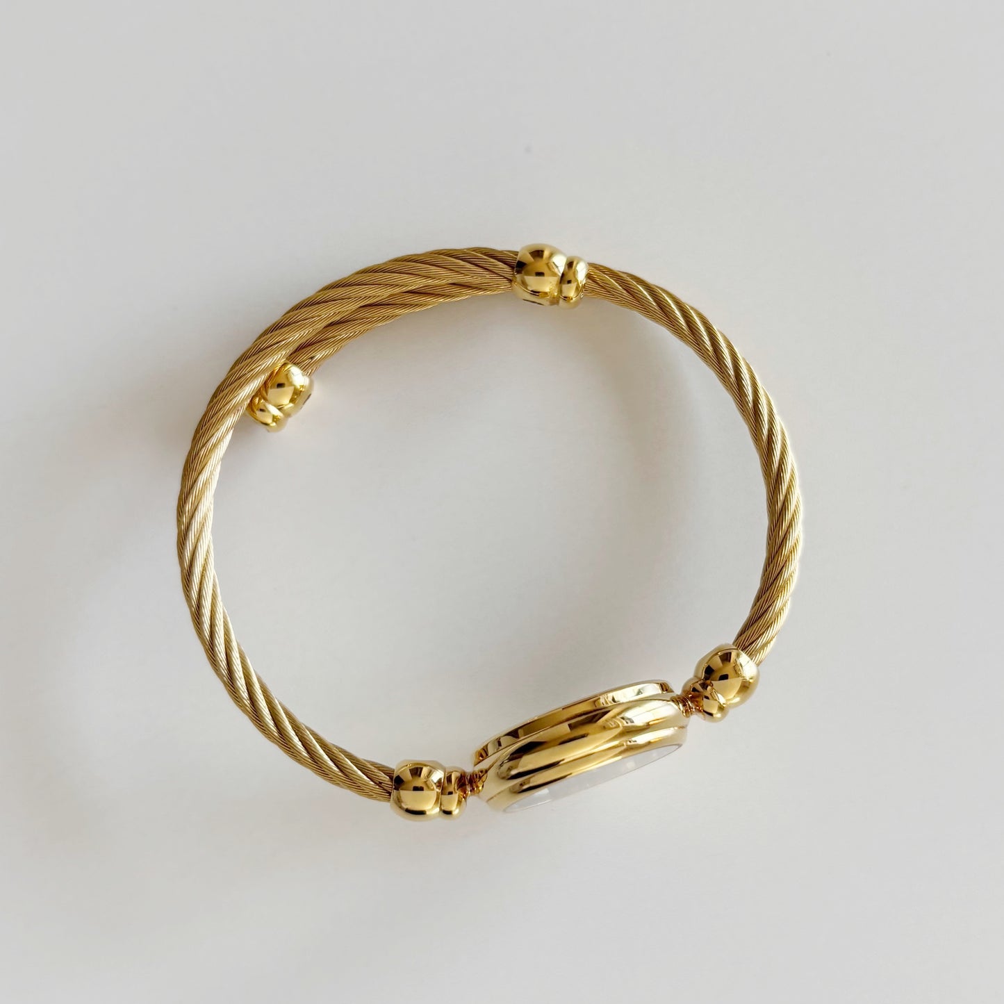 Gucci 1990s Black Dial Gold Plated Cable Bangle Watch