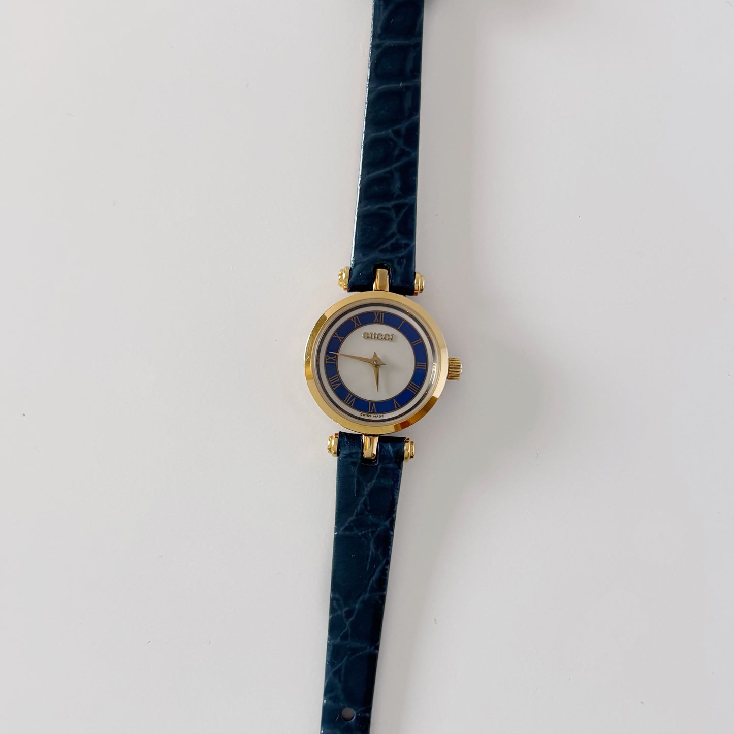 Gucci 1990s Blue Round Dial Gold Plated Watch