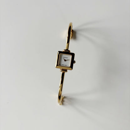 Gucci 1990s Square Dial Gold Plated Bangle Watch