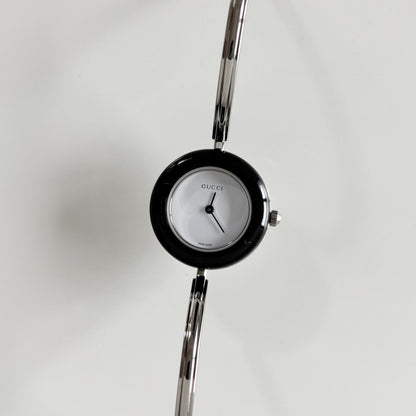 Gucci 1990s Interchangeable Bezel Stainless steel Bangle Watch with 12 bezels, case