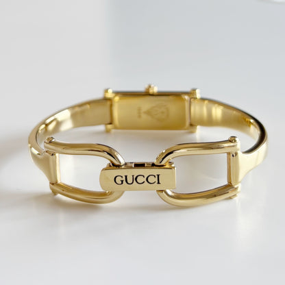 Gucci 1990s Cream Dial Rectangular Gold Plated Bangle Watch