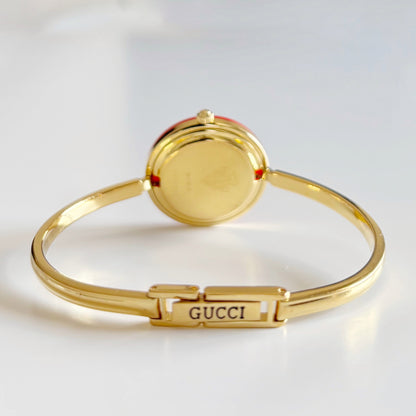 Gucci 1990s Interchangeable Bezel Gold Plated Bangle Watch with 12 bezels, case