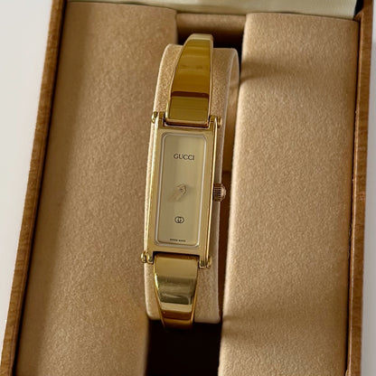 Gucci 1990s Gold Rectangular Dial Gold Plated Bangle Watch