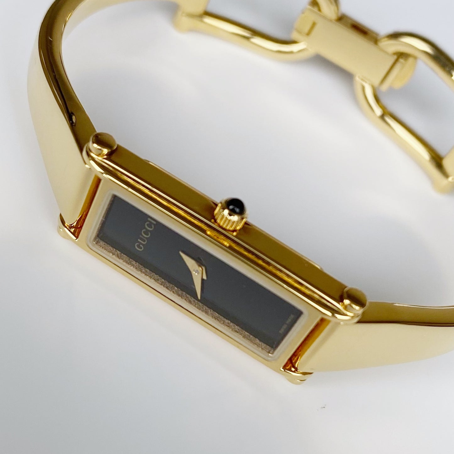 Gucci 1990s Black Dial Rectangular Gold Plated Bangle Watch