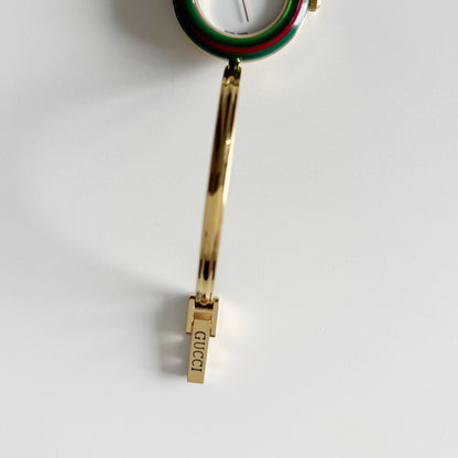 Gucci 1990s Interchangeable Bezel Gold Plated Bangle Watch with 12 bezels, case