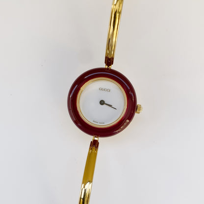 Gucci 1990s Interchangeable Bezel Gold Plated Bangle Watch with 12 bezels, case