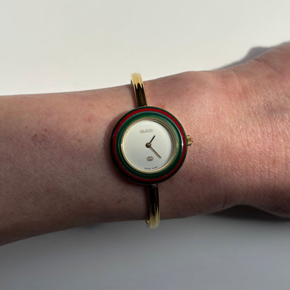 Gucci 1990s Interchangeable Bezel Gold Plated Bangle Watch with 12 bezels, case