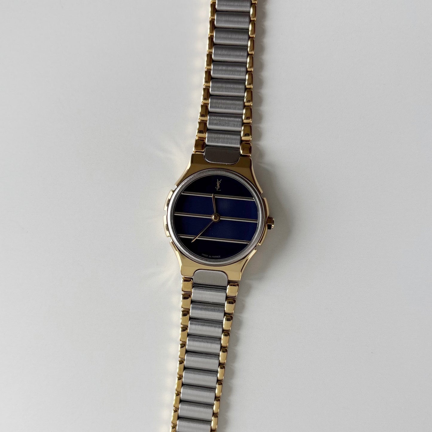 Yves Saint Laurent 1990s Navy Round Dial Two Tone Gold Plated Watch