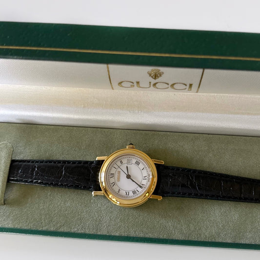 Gucci 1990s Date Round Gold Plated Leather Watch (Women's)