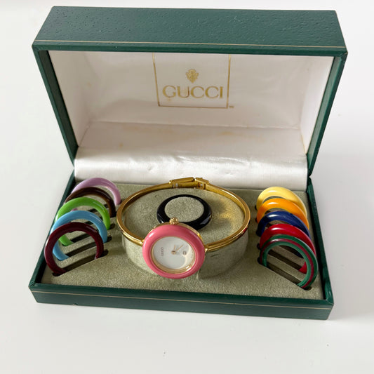 Gucci 1990s Interchangeable Bezel Gold Plated Bangle Watch with 12 bezels, case