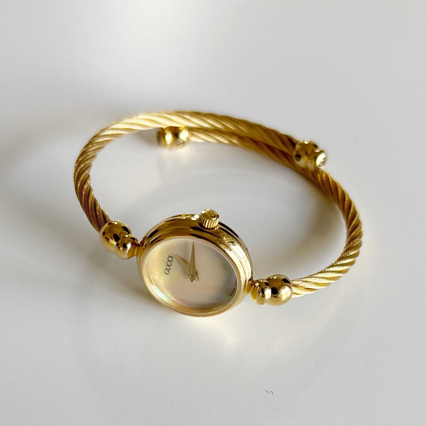 Gucci 1990s Seashell Dial Gold Plated Cable Bangle Watch