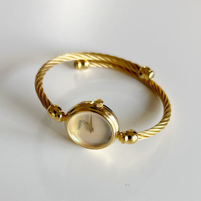 Gucci 1990s Seashell Dial Gold Plated Cable Bangle Watch