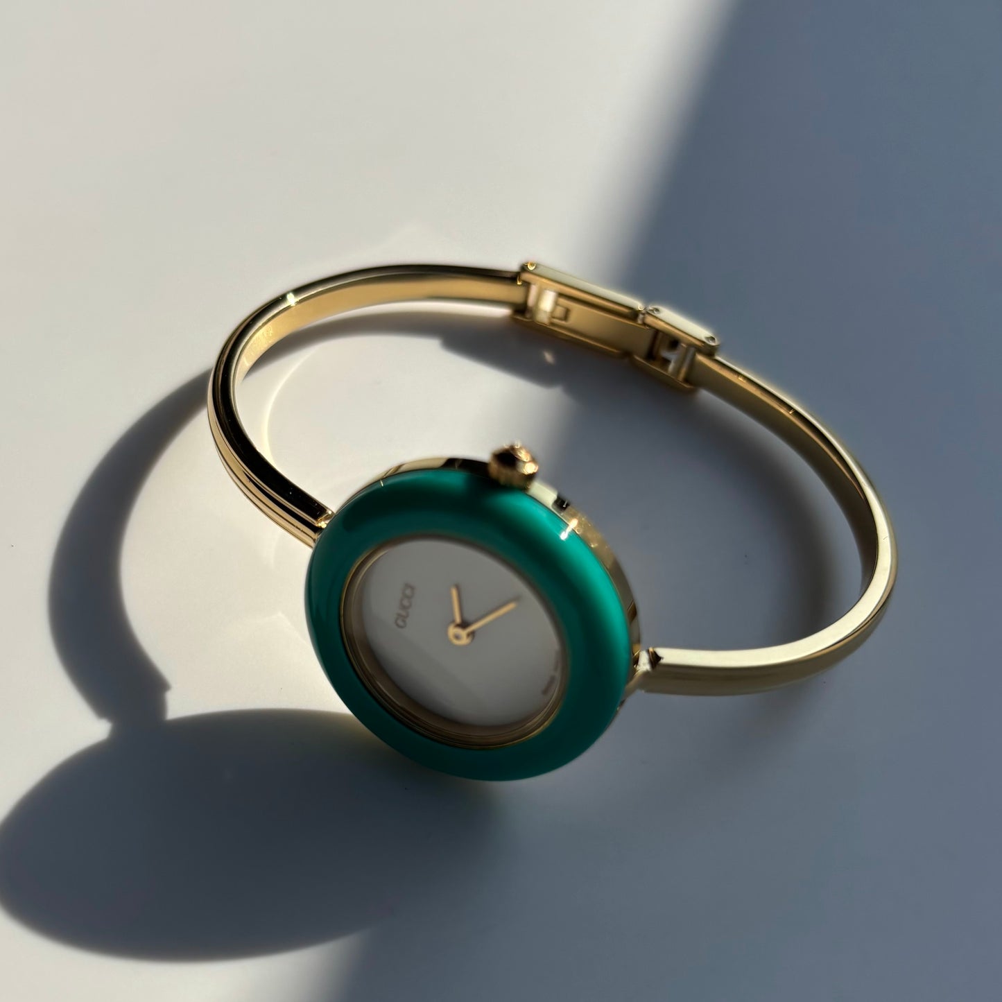 Gucci 1990s Interchangeable Bezel Gold Plated Bangle Watch with 12 bezels, case