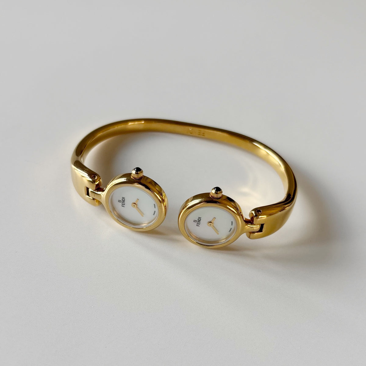 Fendi 1990s Seashell Dial Two Time Zone Gold Plated Bangle Watch
