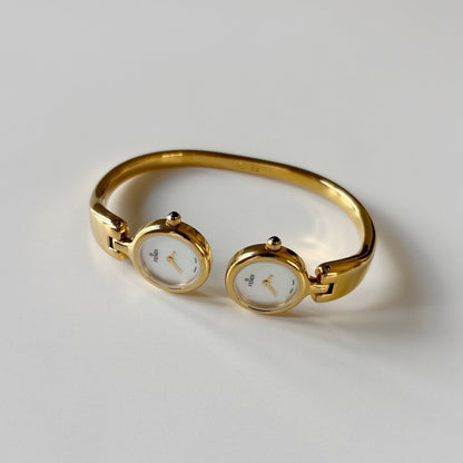 Fendi 1990s Seashell Dial Two Time Zone Gold Plated Bangle Watch