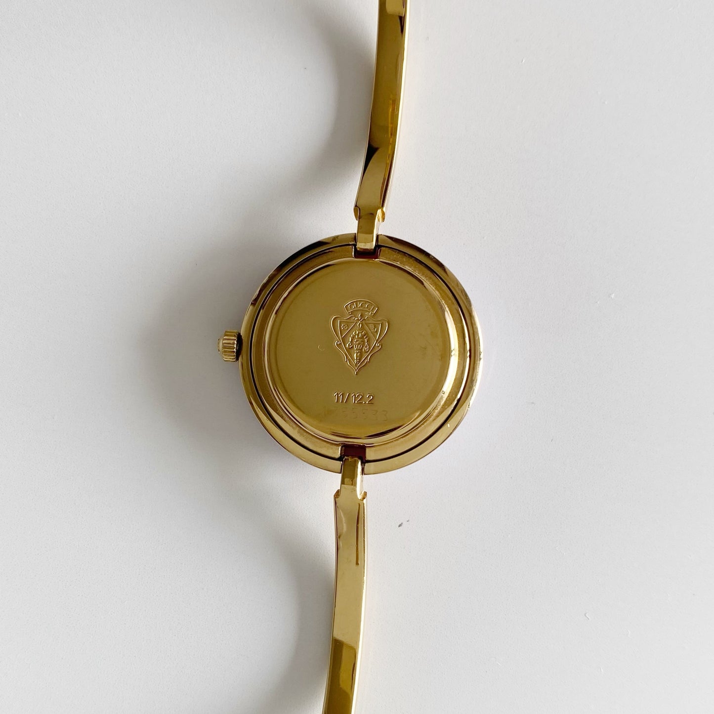 Gucci 1990s Interchangeable Bezel Gold Plated Bangle Watch with 12 bezels, case