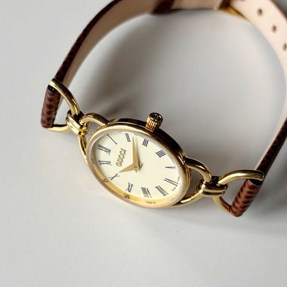 Gucci 1990s Round Dial Horsebit Gold Plated Watch