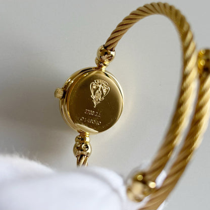 Gucci 1990s Seashell Dial Gold Plated Cable Bangle Watch
