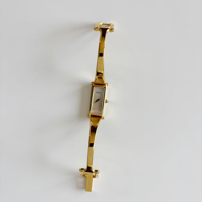 Gucci 1990s Seashell Dial Rectangular Gold Plated Bangle Watch